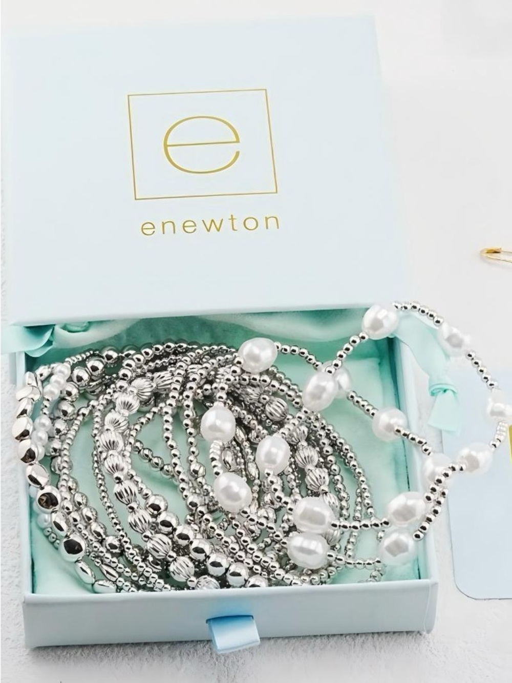 Fourteen-piece enewton white gold bracelet set